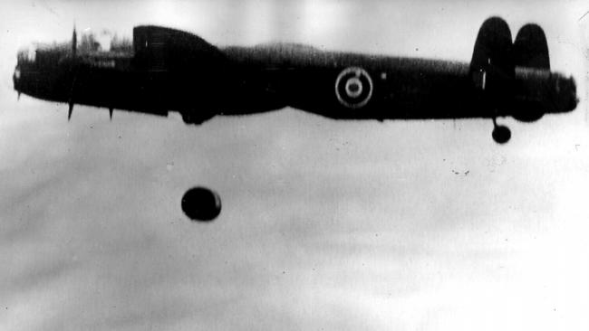 An RAF Lancaster bomber dropping a “bouncing bomb” — special round bomb capable of bouncing along water designed by Barnes Wallis — over Ruhr Valley during the famous “dambuster” Operation Chastise on May 16-17, 1943.