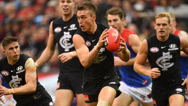 Patrick Cripps exits a stoppage.