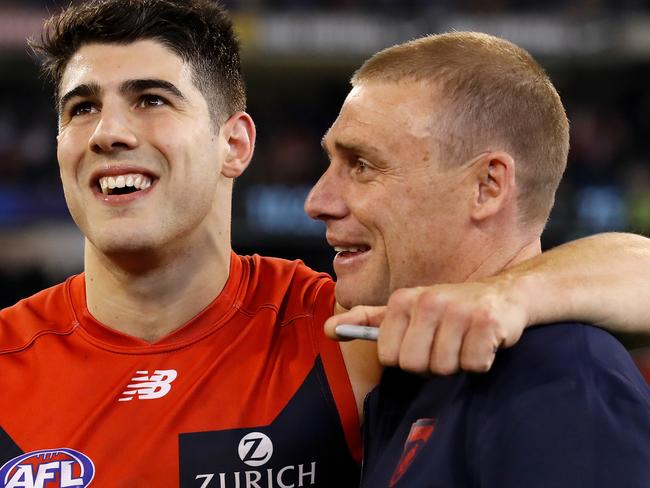 MELBOURNE, AUSTRALIA - SEPTEMBER 07: Christian Petracca of the Demons celebrates with Simon Goodwin, Senior Coach of the Demons during the 2018 AFL First Elimination Final match between the Melbourne Demons and the Geelong Cats at the Melbourne Cricket Ground on September 07, 2018 in Melbourne, Australia. (Photo by Adam Trafford/AFL Media/Getty Images)