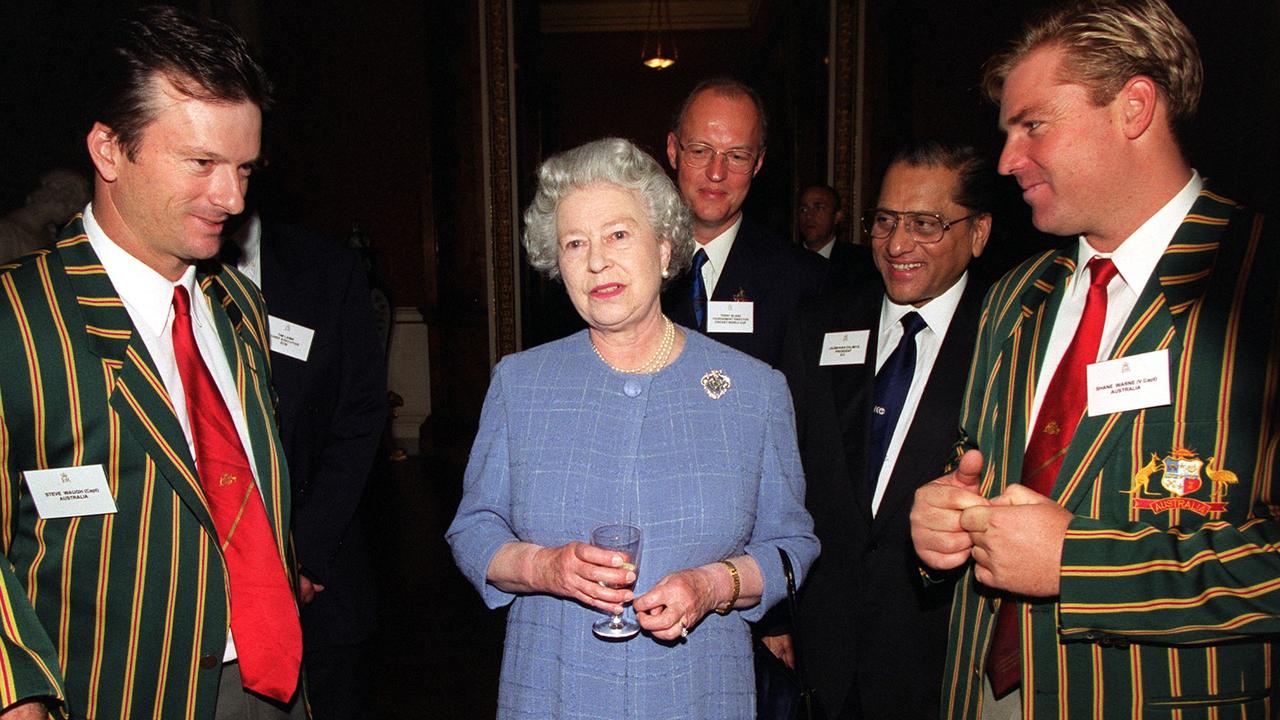 The Queen with Australian cricketers Steve Waugh (left) and Shane Warne (right) during a reception at Buckingham Palace, London, UK, June 2, 1999. Picture: Getty Images