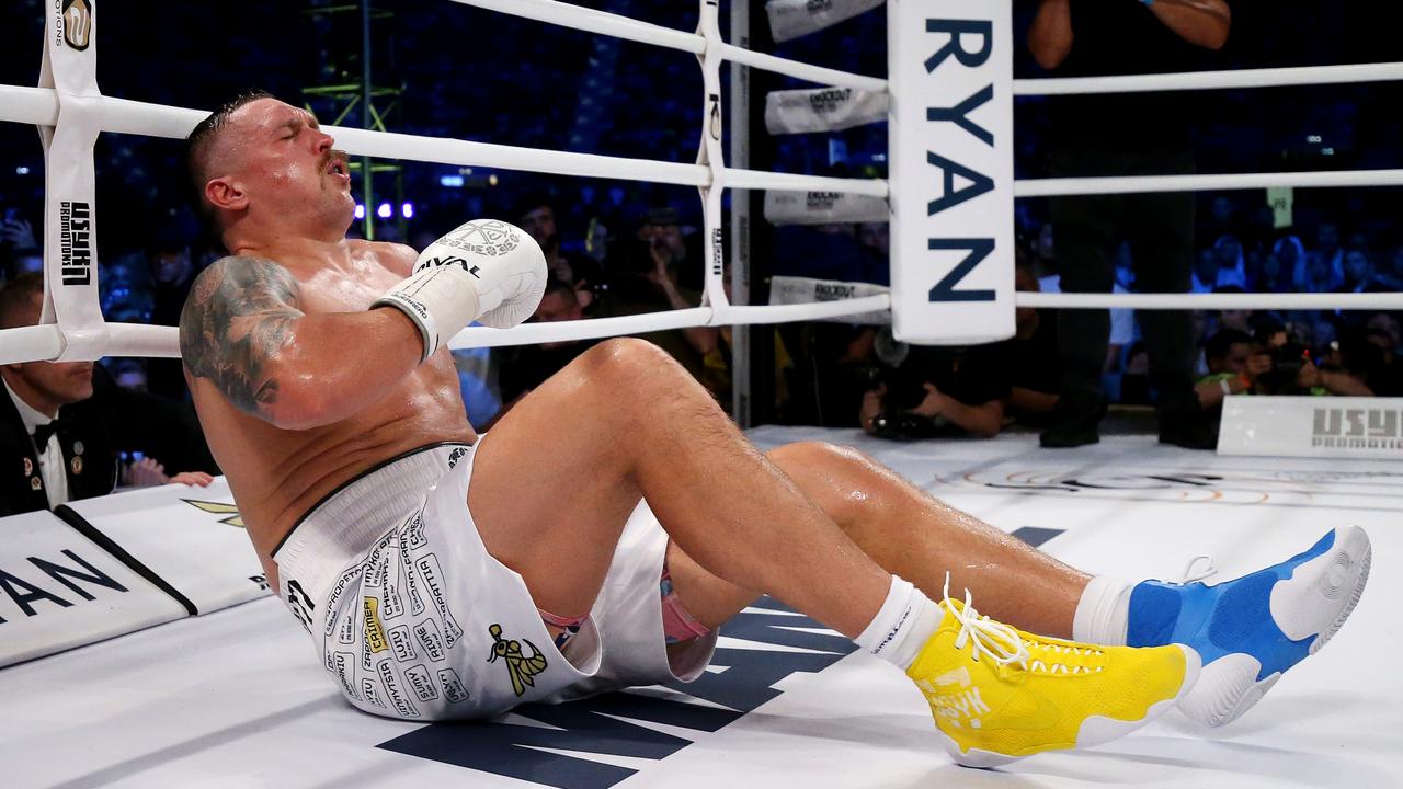 WROCLAW, POLAND - AUGUST 26: Oleksandr Usyk reacts after being knocked down by Daniel Dubois during the Heavyweight fight between Oleksandr Usyk and Daniel Dubois at Stadion Wroclaw on August 26, 2023 in Wroclaw, Poland. (Photo by Gabriel Kuchta/Getty Images)