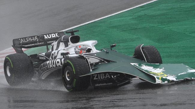 Pierre Gasly on track in the wet at Suzuka. He was involved in an alarming incident where he narrowly missed a recovery truck in near-zero visibility. Picture: AFP