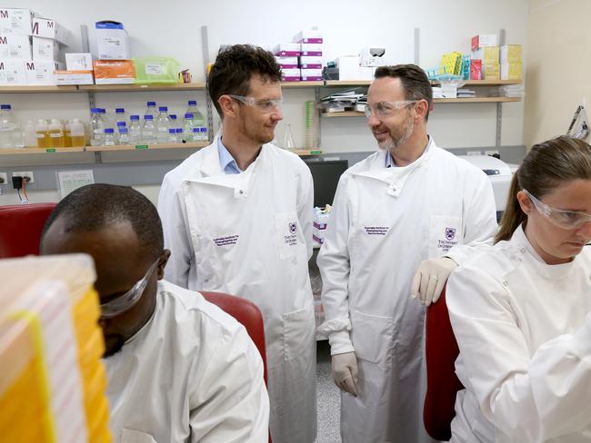 L to R,  Dr Keith Chappell UQ school of chemistry and molecular biosciences, with Dr Trent Munro, and their team in the lab, UQ scientists have been charged with developing a Coronavirus vaccine ASAP, St Lucia, Friday 24th January 2020 - Photo Steve Pohlner