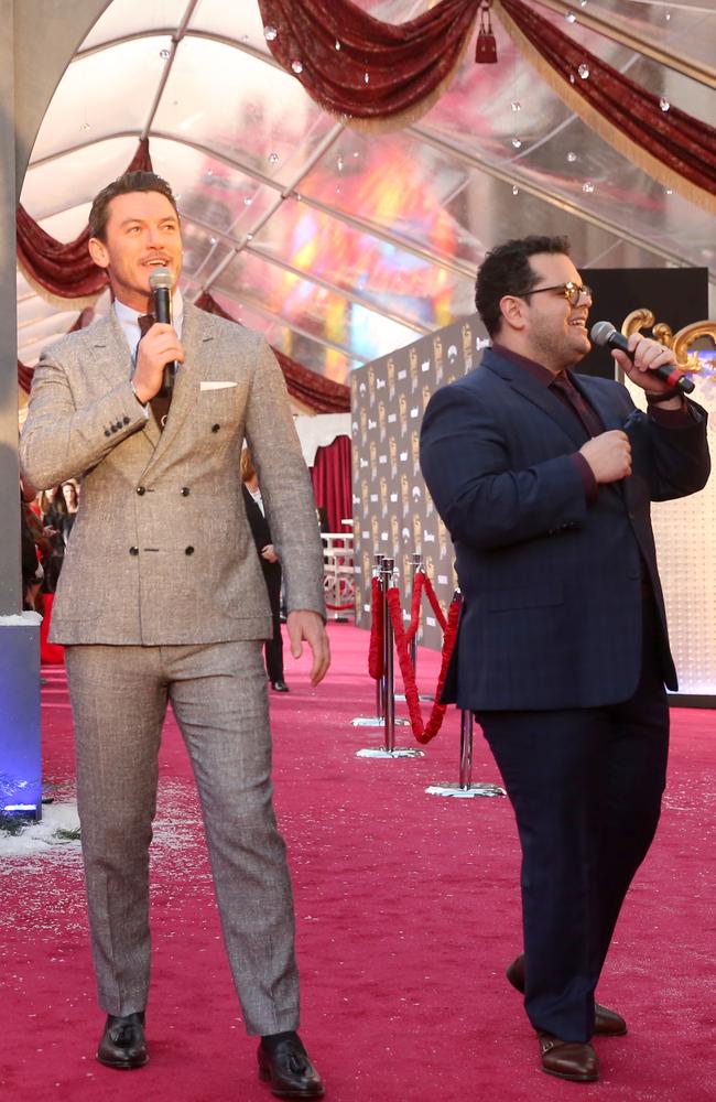 Actors Luke Evans and Josh Gad perform at the world premiere of Disney's live-action Beauty and the Beast in California. Picture: Jesse Grant/Getty Images for Disney