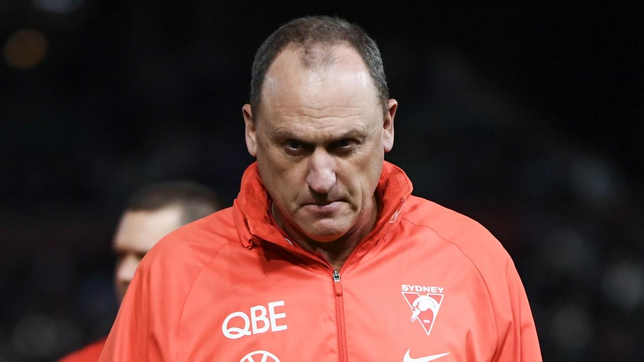 ADELAIDE, AUSTRALIA - AUGUST 03: John Longmire, Senior Coach of the Swans leave the ground after losing the round 21 AFL match between Port Adelaide Power and Sydney Swans at Adelaide Oval, on August 03, 2024, in Adelaide, Australia. (Photo by Mark Brake/Getty Images)