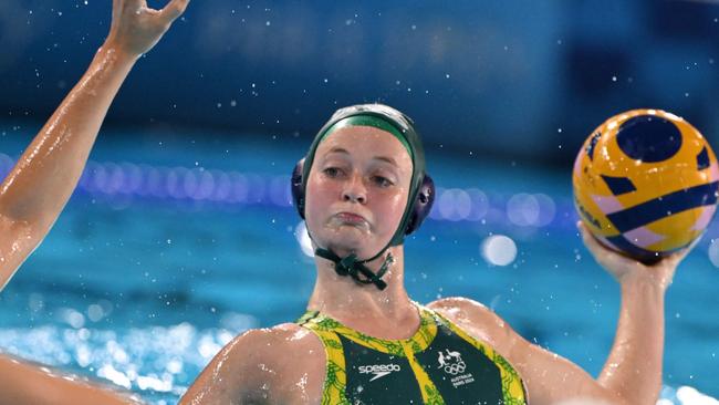 Australia's #06 Abby Andrews shoots the ball in the women's water polo preliminary round group A match between Hungary and Australia during the Paris 2024 Olympic Games at the Aquatics Centre in Saint-Denis, north of Paris, on August 4, 2024. (Photo by Andreas SOLARO / AFP)