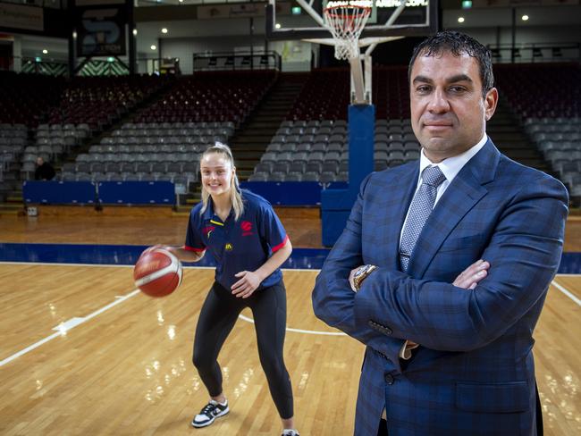 Adelaide Lightnings Brooke Basham with chairman of the Pelligra Group Ross Pelligra who are the new owners of the Adelaide Lightning basketball team at Titanium Security Arena Wednesday ,May,12,2022.Picture Mark Brake