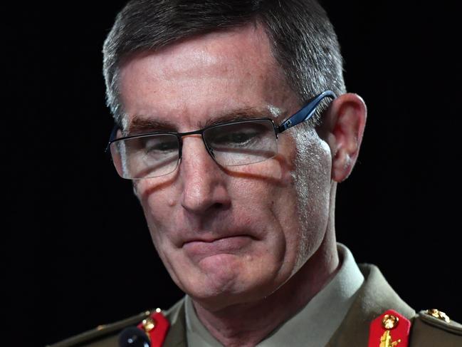 CANBERRA, AUSTRALIA - NOVEMBER 19: Chief of the Australian Defence Force (ADF) General Angus Campbell delivers the findings from the Inspector-General of the Australian Defence Force Afghanistan Inquiry on November 19, 2020 in Canberra, Australia. A landmark report has shed light on alleged war crimes by Australian troops serving in Afghanistan. (Photo by Mick Tsikas - Pool/Getty Images)