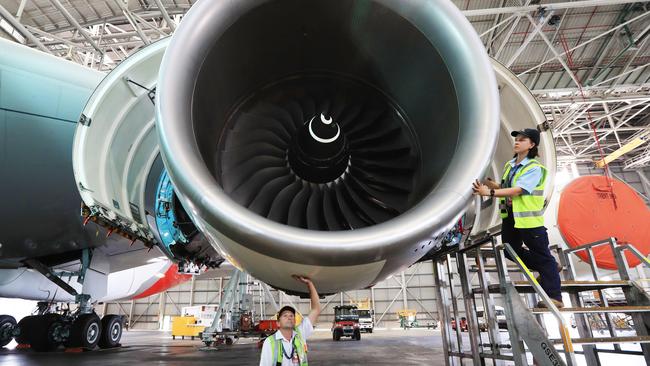 Engineers Timothy Simmons and Sian Barrell in hangar 96 at Sydney airport, with the A380 that recently returned from overseas. Picture: John Feder