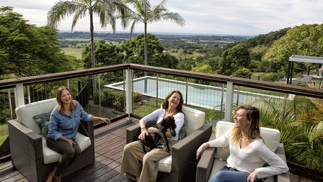 Luxico sales representative Sarah Ogilvie (left) at a Byron Bay holiday property with Samantha Field and Vicki Lee. Picture: Natalie Grono