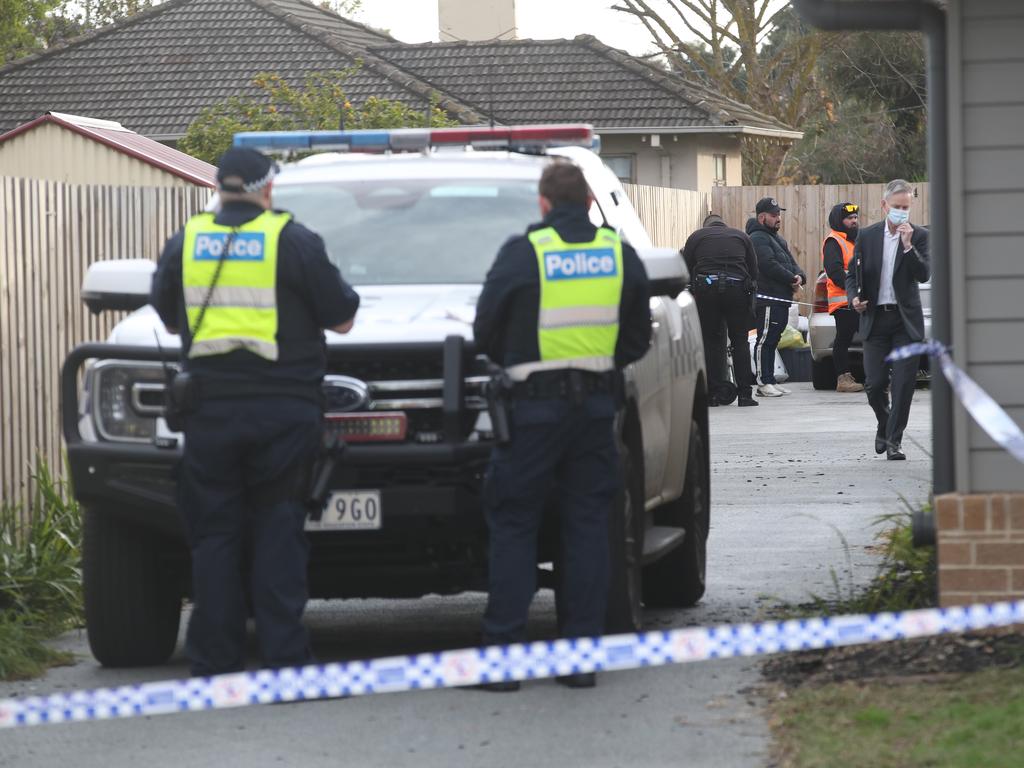 Investigators at the scene in Broadmeadows after four bodies were found. Picture: David Crosling