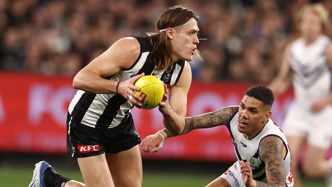 Nathan Buckley says he is not sure whether the time is right for Darcy Moore to captain the Pies. Picture by Michael Klein