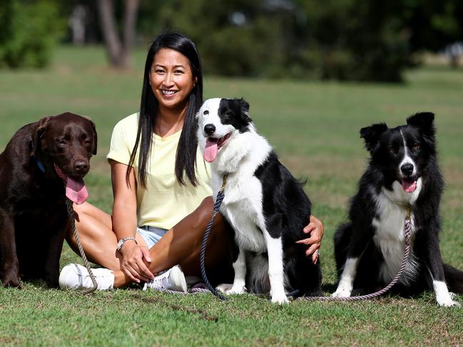 Jess Mitchell and her three dogs Stella, Levi, and Sammy. Picture: AAP/David Clark