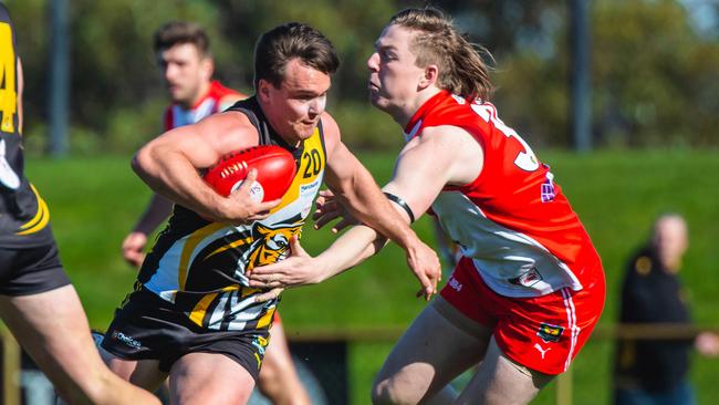 Football. TSL. Tigers V Clarence. Kieran Lovell Tigers and Noah Holmes Clarence. Picture: SOLSTICE DIGITAL