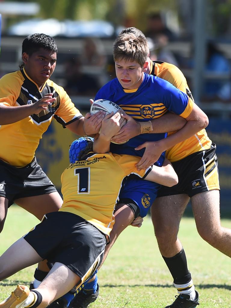 Boys Rugby League State Championship held at Northern Division, Brothers Leagues ground, Townsville. 14-15 years. Capricornia (gold) v South West (blue). Nate Freeman of St John's School, Roma.