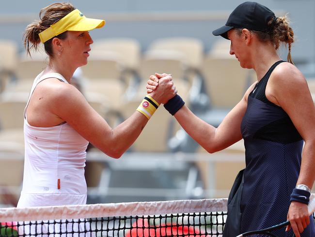 PARIS, FRANCE - JUNE 06:  Anastasia Pavlyuchenkova of Russia shakes hands with Victoria Azarenka of Belarus after winning their Women's Singles fourth round match on day eight of the 2021 French Open at Roland Garros on June 06, 2021 in Paris, France. (Photo by Julian Finney/Getty Images)