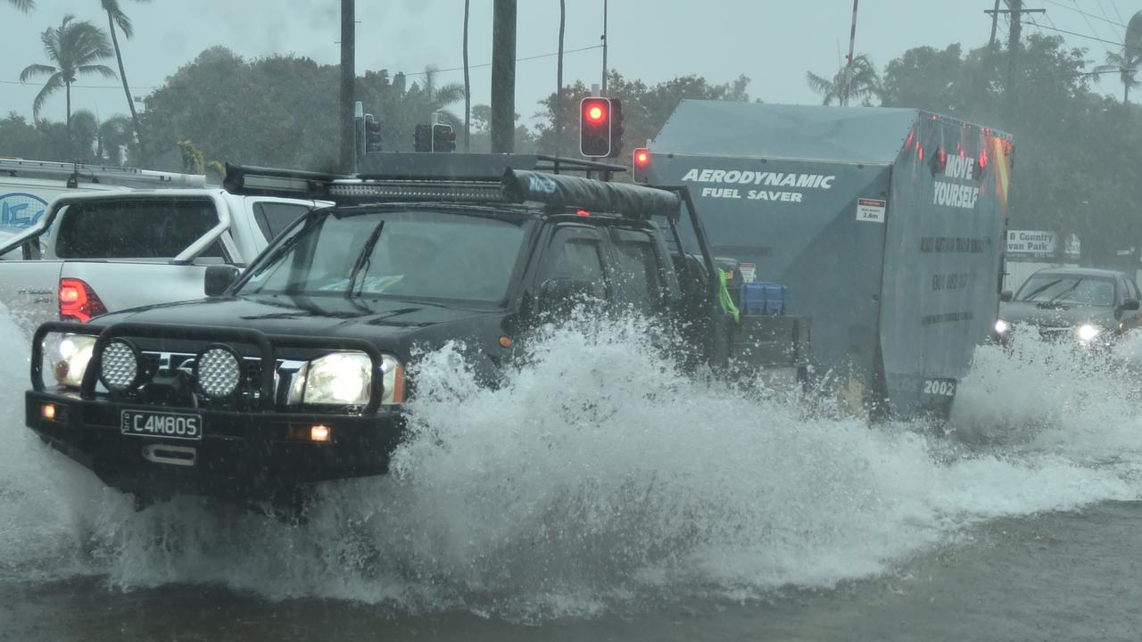 Heavy rain lashes Townsville causing flash flooding. Ingham Road and Cowley Street intersection. Picture: Evan Morgan