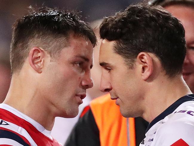 SYDNEY, AUSTRALIA - SEPTEMBER 30:  Cooper Cronk of the Roosters talks to Billy Slater of the Storm after the 2018 NRL Grand Final match between the Melbourne Storm and the Sydney Roosters at ANZ Stadium on September 30, 2018 in Sydney, Australia.  (Photo by Mark Metcalfe/Getty Images)