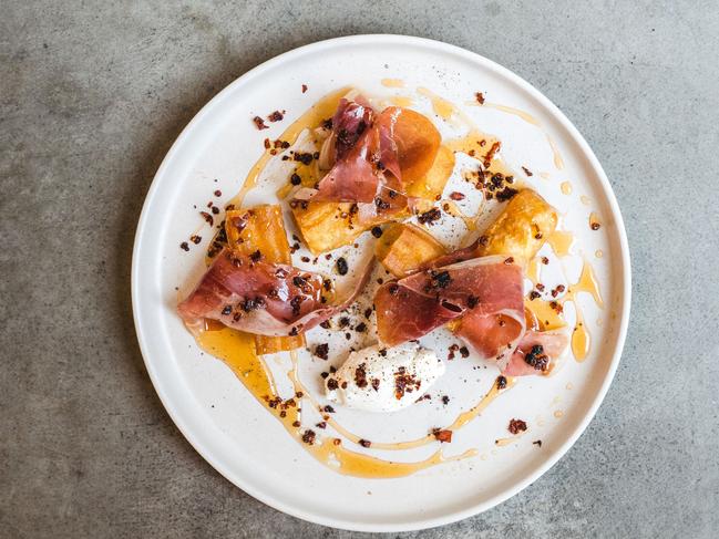 Savoury doughnut, jamon, Woodside goat's curd, chilli honey at Cremorne Hotel, Unley