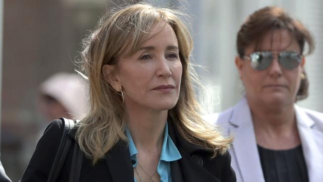 Actress Felicity Huffman has agreed to plead guilty to paying $US15,000 to rig her daughter’s test scores. Picture: AP 