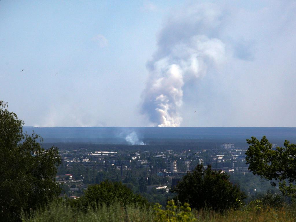 A large plume of smoke rising on the horizon behind the town of Severodonetsk, amid the Russian invasion of Ukraine. Picture: AFP