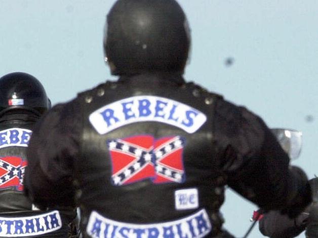 D/I Motor cycle riders Rebel bikie gang members riding leaving Port Augusta on highway one on their way to WA 14 Oct 2000. rebels motorcycle