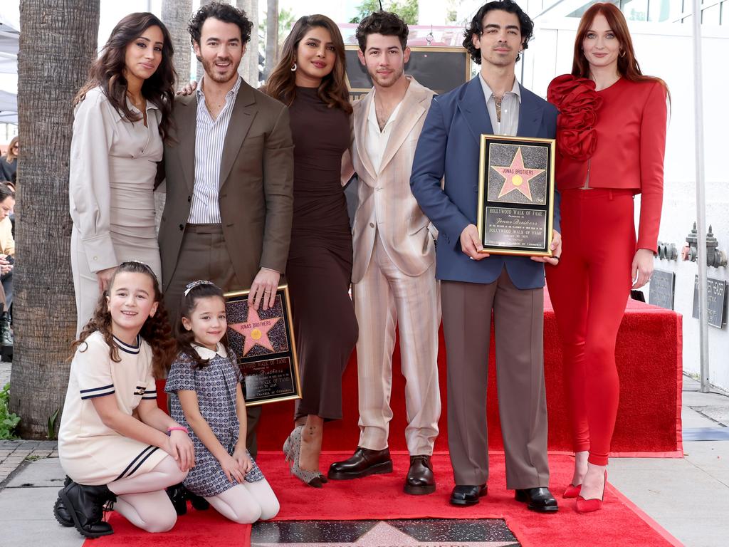 Joe Jonas with estranged wife Sophie Turner and his brothers. Picture: Getty Images