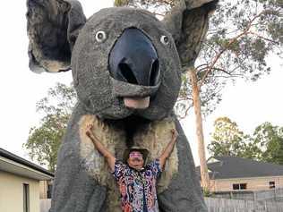 MAMMOTH MARSUPIAL: Giant Koala and Townsville Cultural Festival's Festival Director and sculptor, Dr Farvardin Daliri (OAM). Picture: contributed