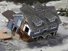 27/11/2012 WIRE: FILE - This Wednesday, Oct. 31, 2012 file aerial photo shows a collapsed house along the central Jersey Shore coast. Though it�s tricky to link a single weather event to climate change, Hurricane Sandy was �probably not a coincidence� but an example of extreme weather events that are likely to strike the US more often as the world gets warmer, the U.N. climate panel�s No. 2 scientist told the Associated Press Tuesday, Nov. 27, 2012. (AP Photo/Mike Groll, File) Pic. Ap