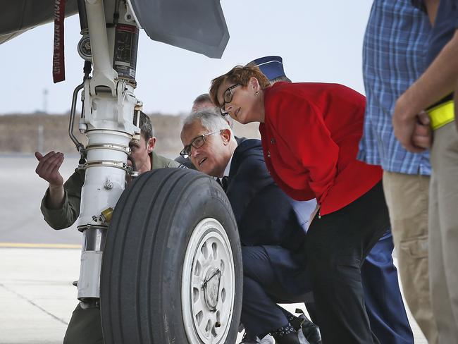 Malcolm Turnbull and Defence Minister Marise Payne inspecting a new JSF on the tarmac at Avalon. Picture: David Caird