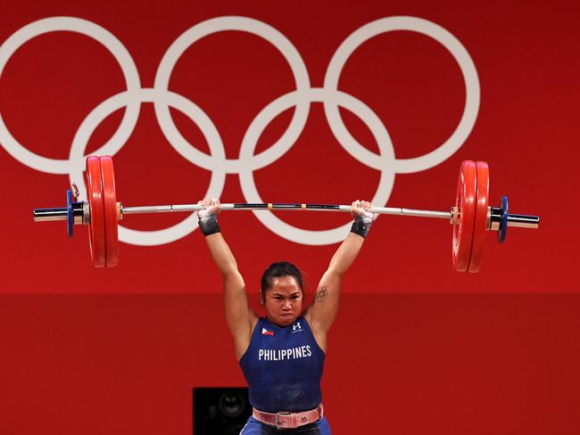 Hidilyn Diaz of Team Philippines competes during the Weightlifting - Women's 55kg Group A. Picture: Chris Graythen/Getty Images)