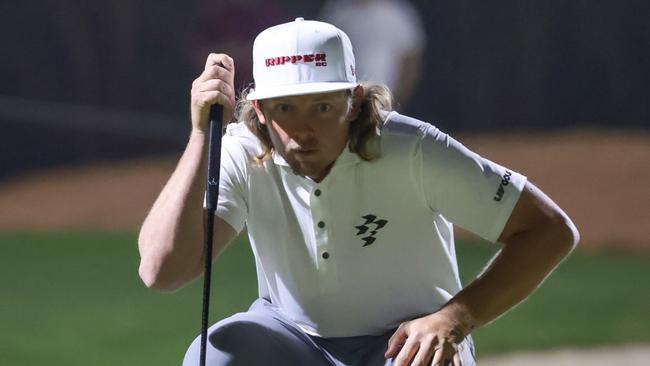 RIYADH, SAUDI ARABIA - FEBRUARY 6: Cameron Smith of team Ripper GC reads the green on the 5th hole during day one of LIV Golf Riyadh at Riyadh Golf Club on February 6, 2025 in Riyadh, Saudi Arabia. (Photo by Abdullah Ahmed/Getty Images)