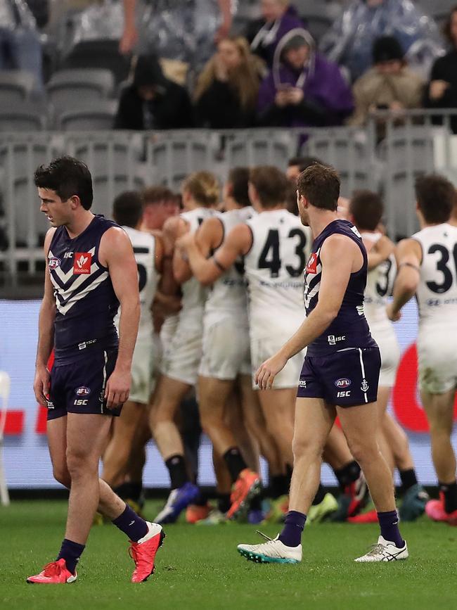 Brayshaw walks away as Carlton players celebrate. Picture: Getty