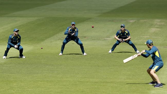 David Warner, Steve Smith and Cameron Bancroft practice slips catching with coach Justin Langer at Edgbaston, a possible indicator of their spots in the first Test