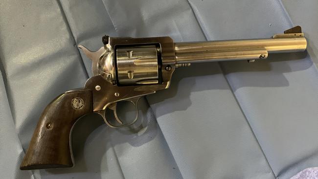 A gold handgun found at a Sydney home during raids connected to the alleged syndicate.