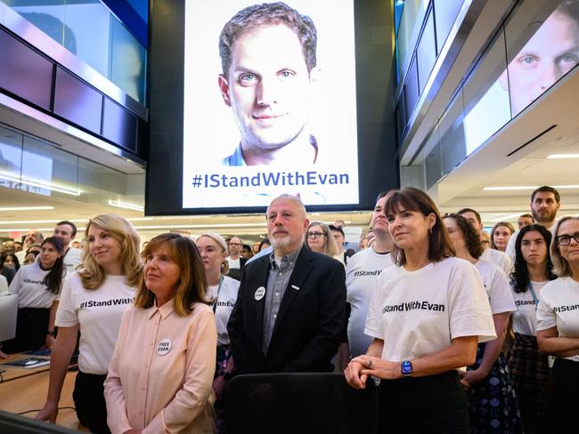 Ella Milman and Mikhail Gershkovich, the parents of Evan Gershkovich, stood with Wall Street Journal staff in the newspaper’s New York newsroom in August 2023. Picture: Cam Pollack/The Wall Street Journal