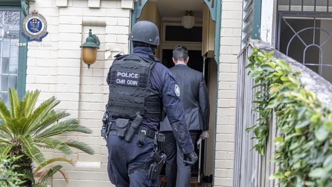 Detectives raided multiple homes and arrested eight men on Thursday.