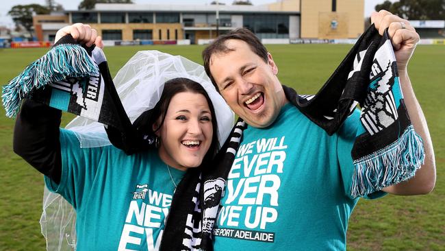 Superfans Michelle and David Green at Alberton Oval where they married in 2010. Picture: Calum Robertson