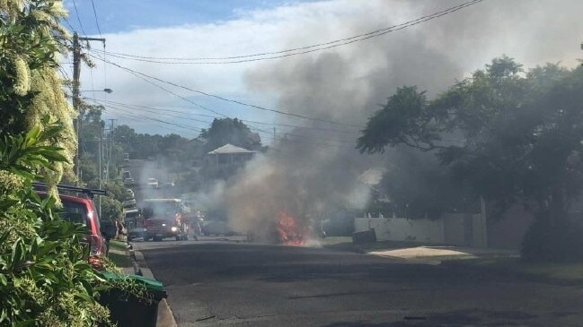 The car on fire in suburban Brisbane.