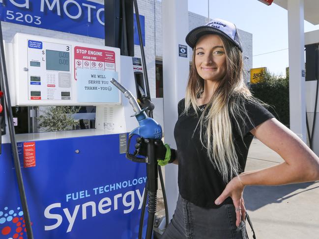 Balnarring Motors has always offered good old fashioned service. They man the pumps for you and bring the EFTPOS machine to your car so you don't have to get out. Brooke Millican working at the Service station.Picture by Wayne Taylor 1st April 2020