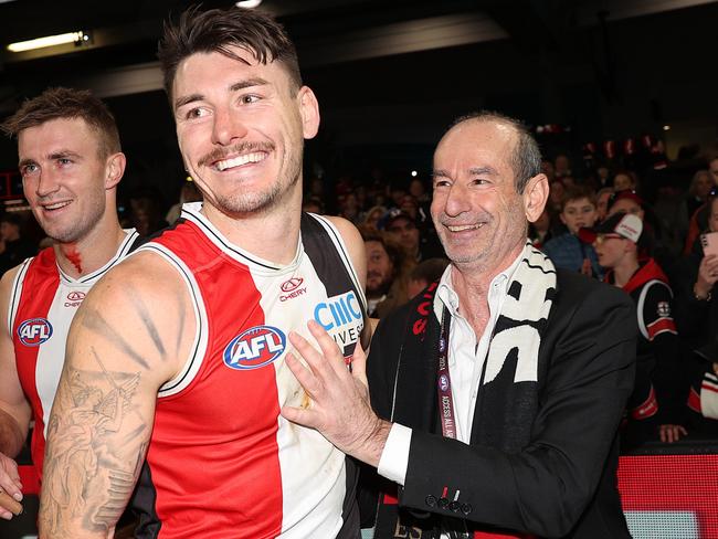 MELBOURNE, AUSTRALIA – JULY 07: Andrew Bassat, President of St Kilda Football Club celebrates with Josh Battle of the Saints during the round 17 AFL match between St Kilda Saints and Sydney Swans at Marvel Stadium, on July 07, 2024, in Melbourne, Australia. (Photo by Kelly Defina/Getty Images)