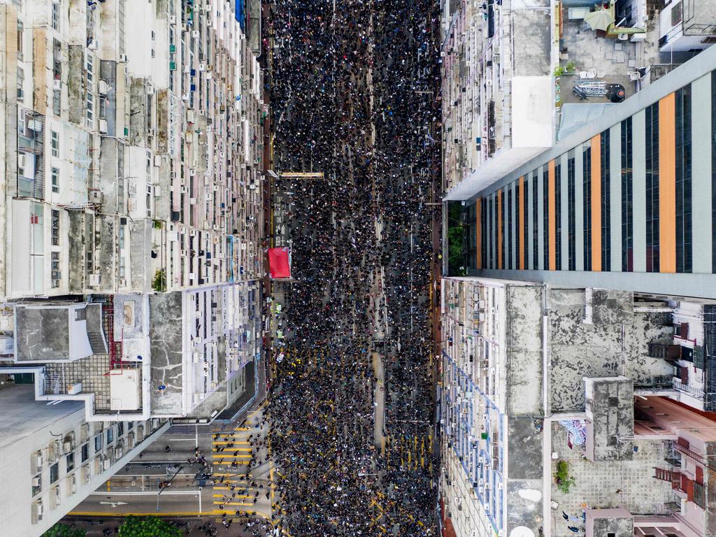 An overhead view shows thousands of protesters marching through Hong Kong. Picture: STR/AFP
