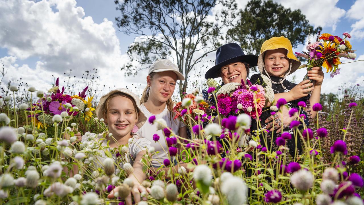 Kacee Murray with her nieces and nephews Violet (left), Autumn and Theo Murray in the blooms as Karinya in the Valley host a pick your own flower session, Saturday, January 4, 2025. Picture: Kevin Farmer