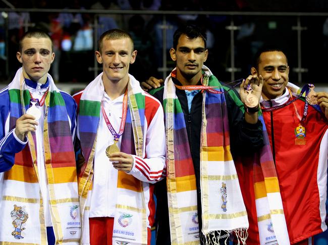 Moala (far right) with his bronze medal at the 2010 Commonwealth Games. He was beaten in the semis by future undisputed super-lightweight world champion Josh Taylor (far left). Picture: Matt King/Getty Images)