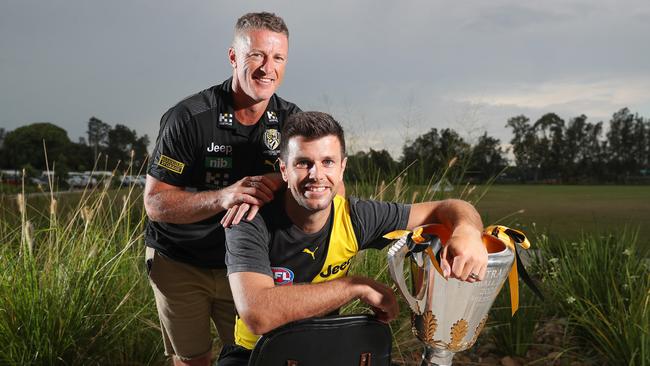 Richmond coach Damien Hardwick with his captain Trent Cotchin and their cup. AFL – Sunday, 25th October, 2020 – Richmond players the afternoon after the historic Grand Final Win – at their Hub location in the Gold Coast. Picture: Sarah Reed