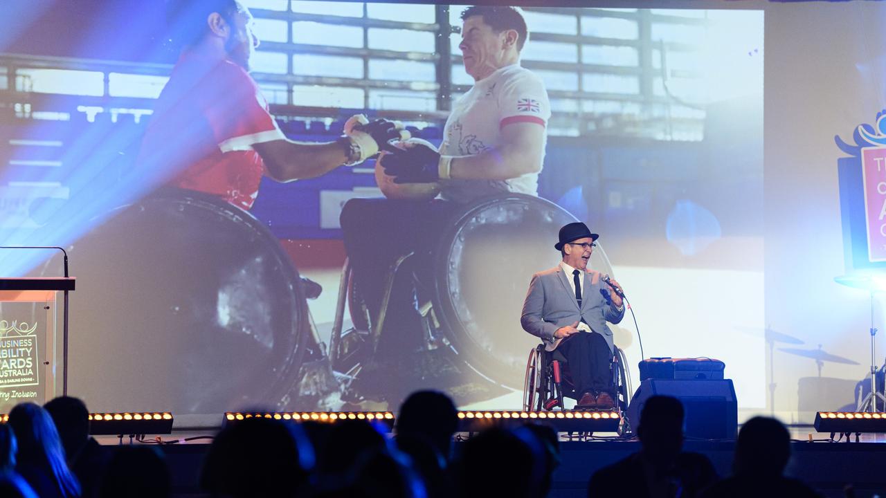 Tony Dee on stage at the Business disAbility Awards of Australia at Edmund Rice Cultural Centre, Saturday, May 17, 2025. Picture: Kevin Farmer