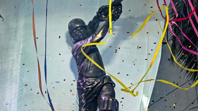 Statue of the former Indian cricketer Sachin Tendulkar. Photo by Punit PARANJPE / AFP