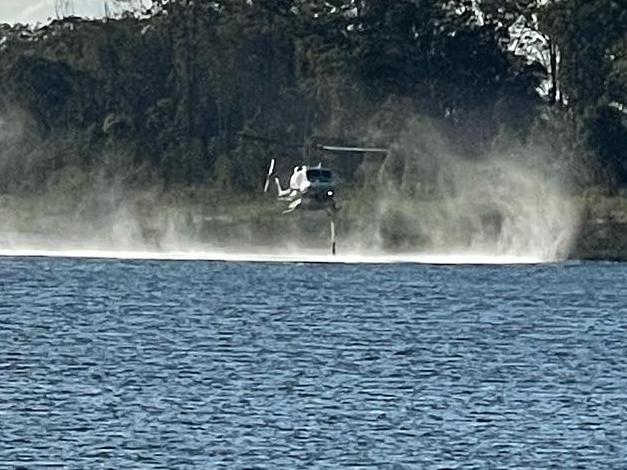 Water bombers called in as bushfire tears through 40ha