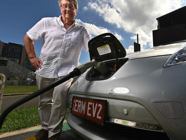 09/11/2021: Energy billionaire Trevor St Baker recharges his 4 year old Nissan Leaf with one of his companies made charging stations near his home in St Lucia, Brisbane. Trevor owns a one of the biggest charging station companies  in the world.  Lyndon Mechielsen/The Australian