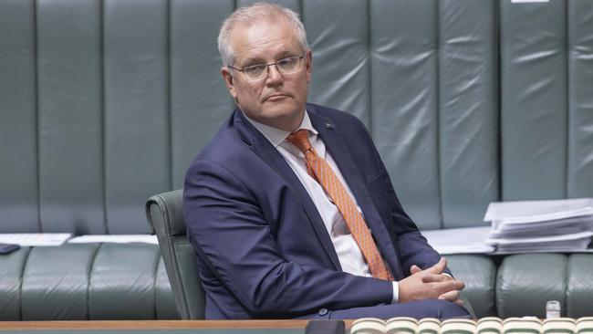 Scott Morrison ‘confused the public with messages suggesting that things could carry on as normal’, according to a Labor and Greens-dominated Senate committee. Picture: Gary Ramage